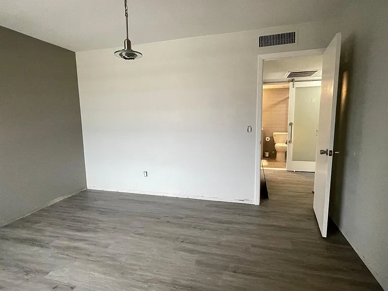 Bedroom 1 with walk-in closet.