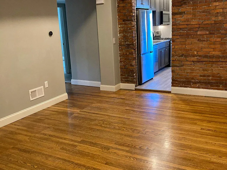 Living room with view of kitchen