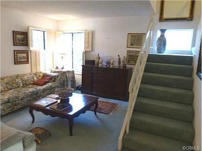 Sunny Living Room faces greenbelt