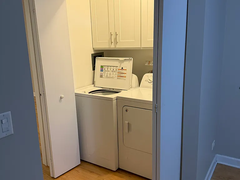 In unit laundry located in the large bedroom