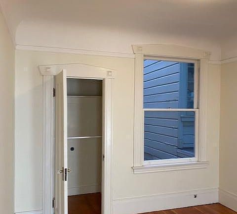 Bedroom or home office space. Closet and double doors to the front room.