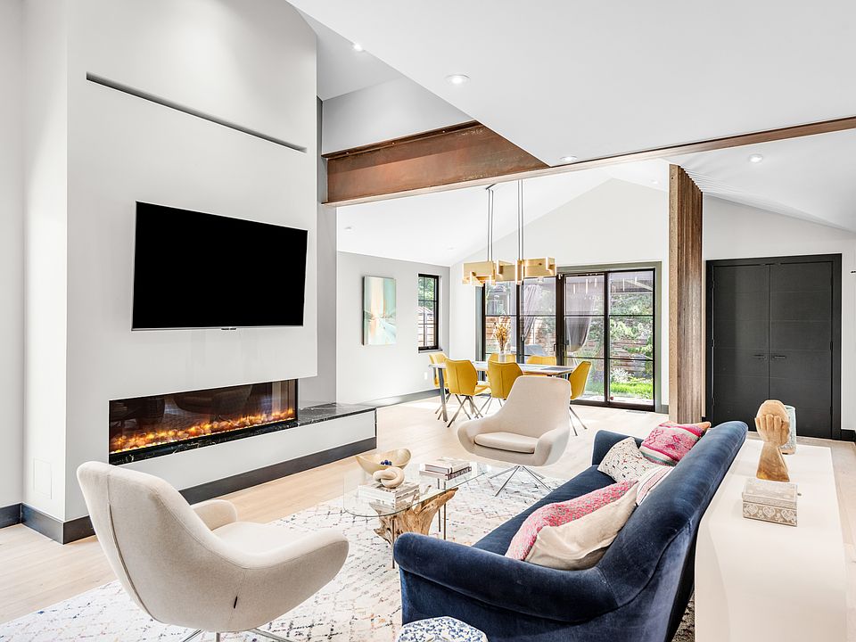 Open space living room with cozy fireplace