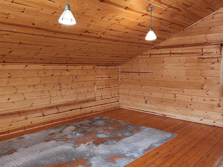 There is plenty of room for a large bed in this bedrrom.