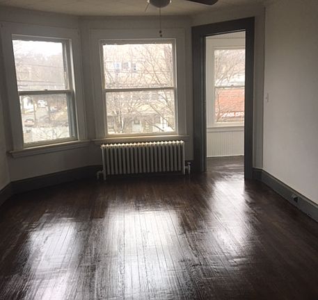 Large living room with lots of natural light