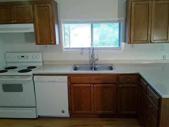 Kitchen with new counter-top and Dishwasher.