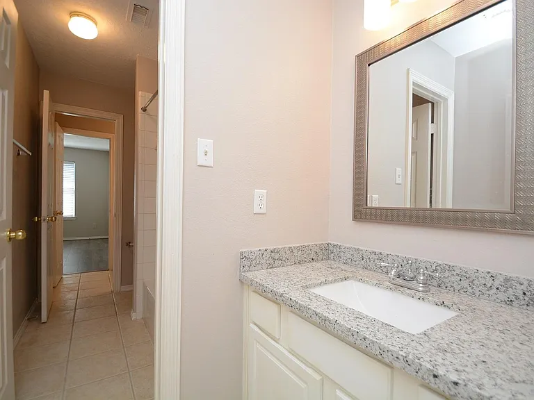 Jack and Jill bathroom with 2 seperate sinks on each side