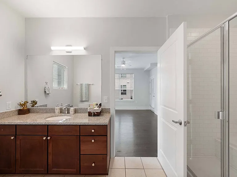 Indulge in a spacious bathroom that combines luxury and relaxation.