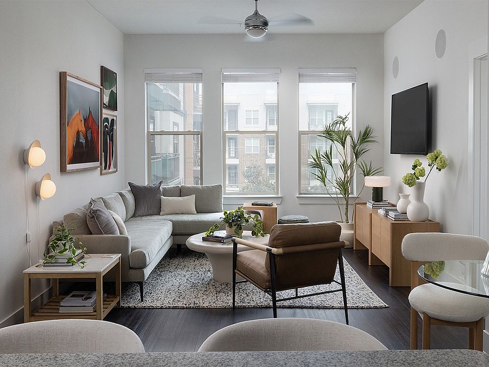 Apartment Living Room with wood-style flooring.