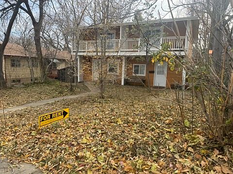 Front yard- only 2 units- side by side townhomes- shade trees in summer- mountain views-