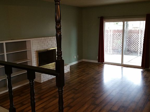 Family room with fireplace and shelving