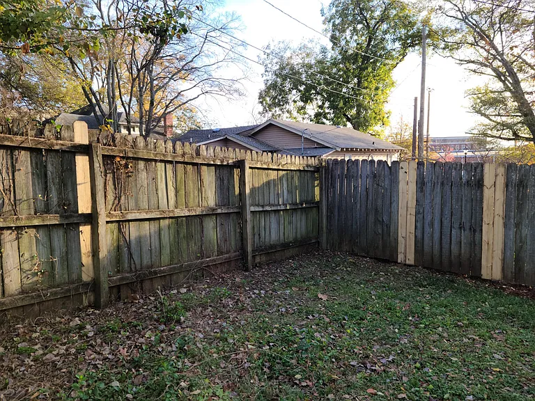 Fenced in backyard with privacy