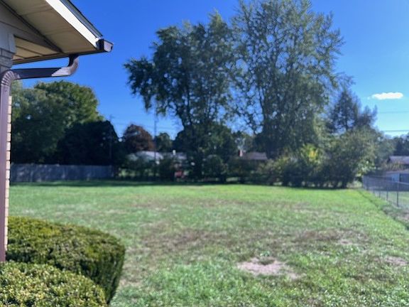 Back yard from side of garage.