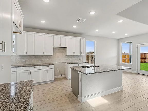 Kitchen *Representative Builder Photo _ Actual finishes may vary.