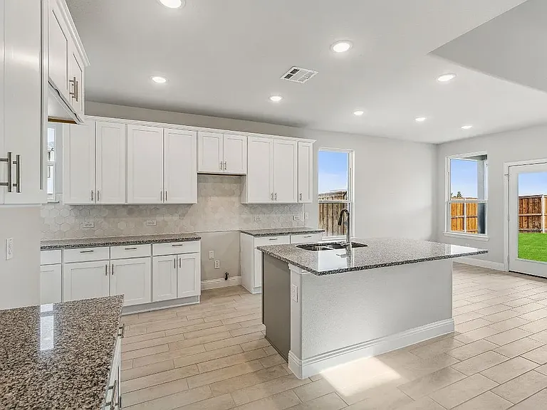 Kitchen *Representative Builder Photo _ Actual finishes may vary.