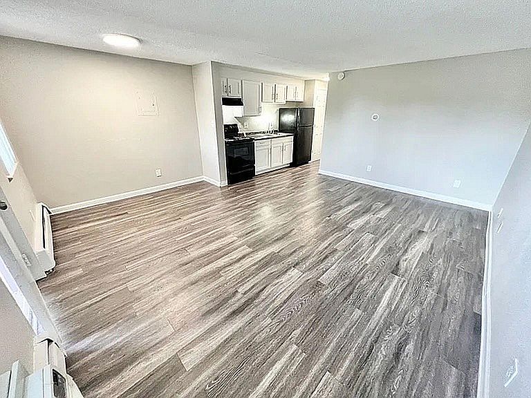 Explore this contemporary space blending comfort and style with its open-plan design.