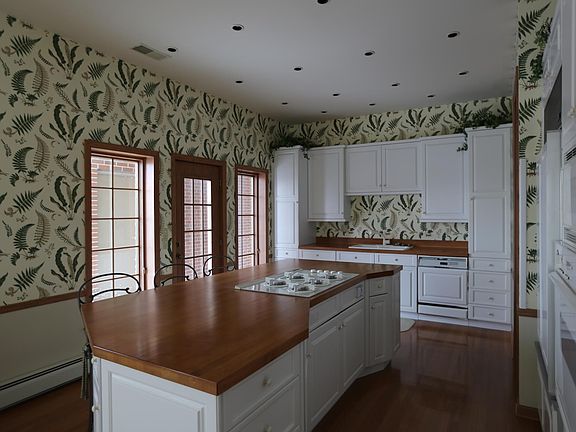 Hardwood floors in the kitchen with beautiful hardwood countertops