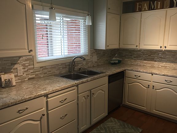 Pull-out faucet/garbage disp