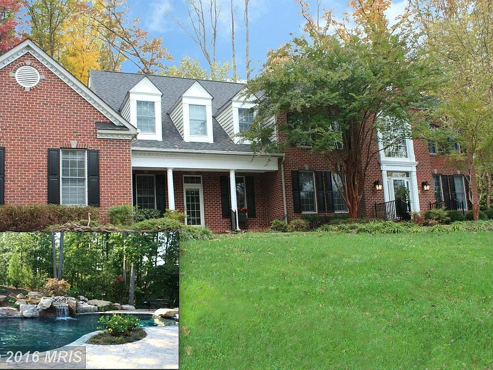 Graciously sited on 2.01 acres backing to woods