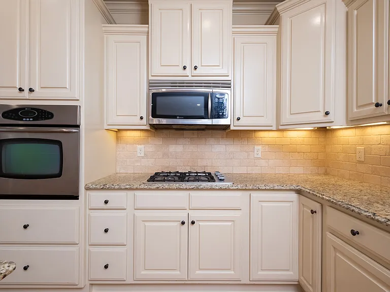 Kitchen Cabinets. Oven and Microwave.