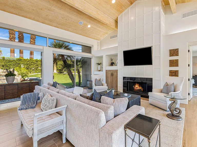 Living room with tv and fireplace