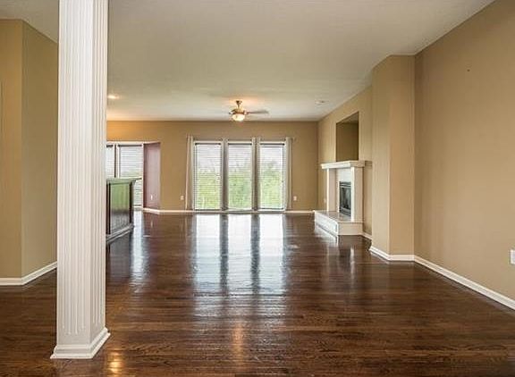 Another view of the open floor plan on the main floor.  Notice the green space from the windows at the back of the house.