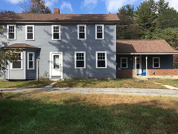 Enjoy yard from brick porch