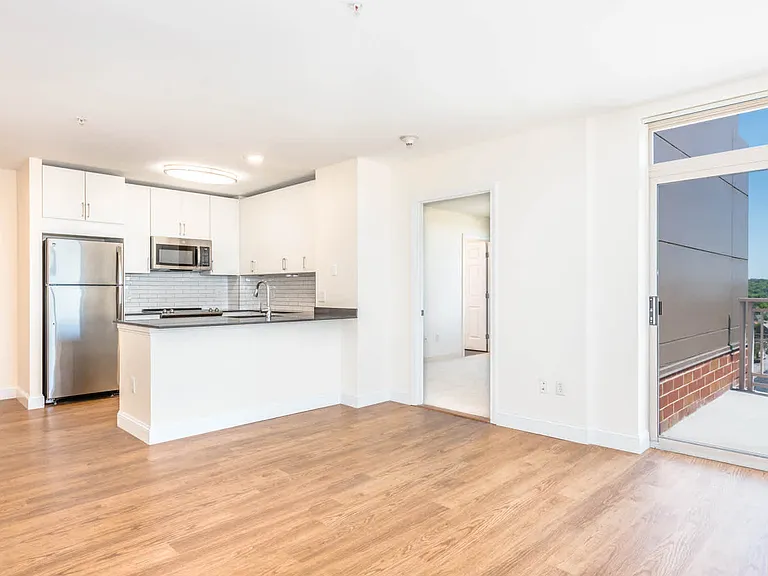 Living Room with Hard Surface Flooring and Balcony