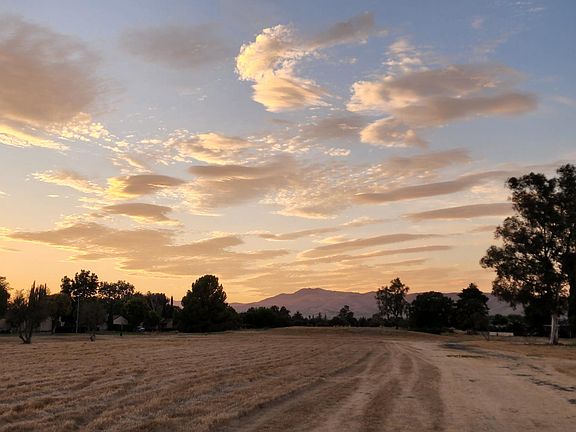 View of green space behind home