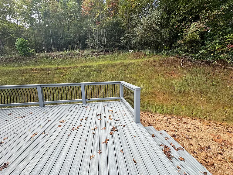 Bigger new deck. Old deck photo in group of photos.