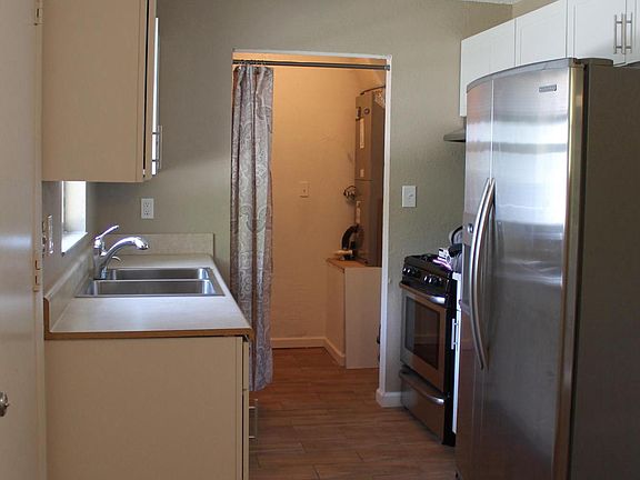 White shaker cabinets, stainless appliances
