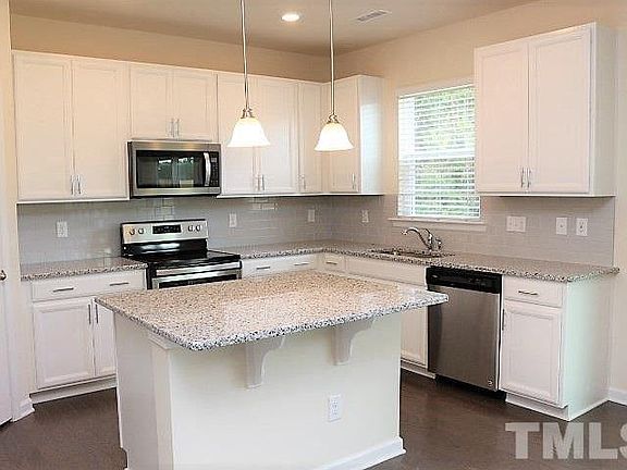 Kitchen with white cabinets