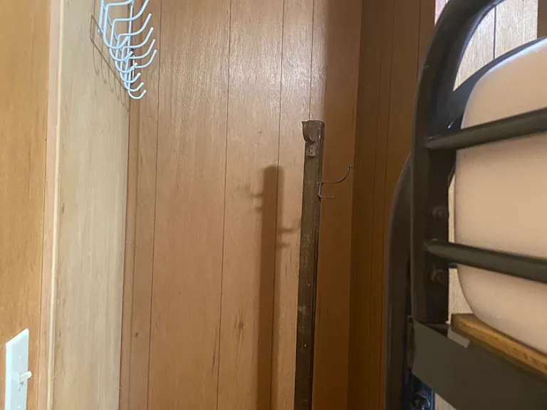 Door with over door racks for extra hanging space