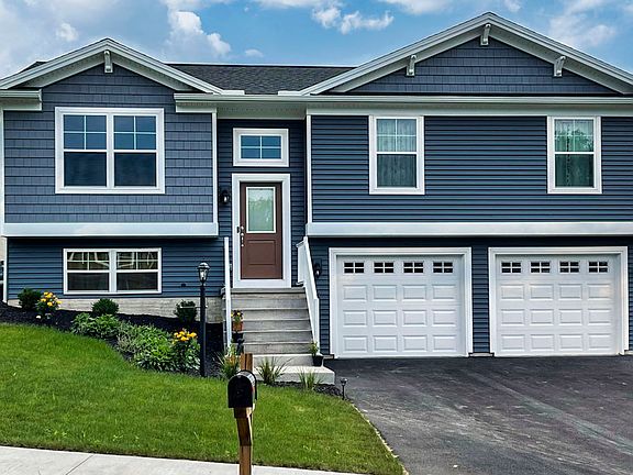 Front exterior of the Norwood Elevation C - Streamline Series by S A Homes -bi-level home with stair