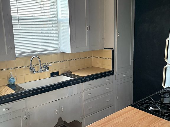 kitchen with new oven and refrigerator