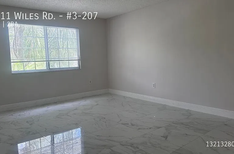 5011 Wiles Rd #3-207 — Photo 24