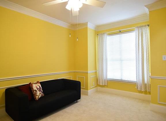 Formal Dining Room has Elegant Moulding and Kitchen Access. Also makes a great Living Room!