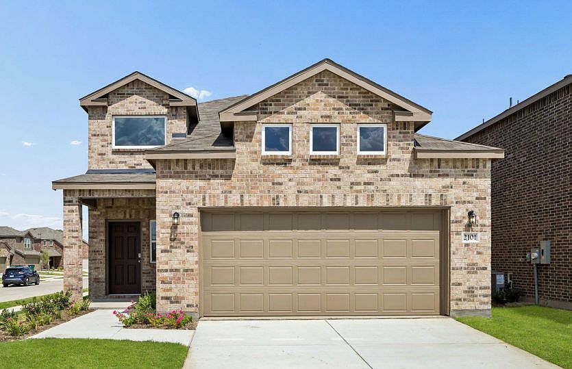 The Fentress, a 2-story new construction home with a two car garage