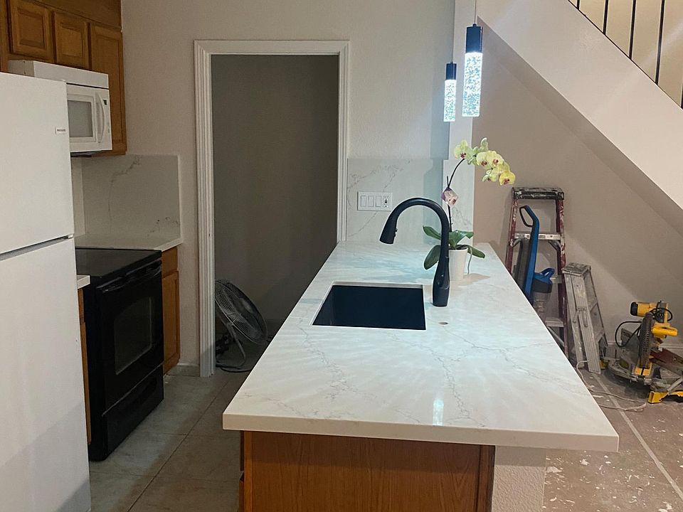 New Quartz counters, backsplash and sink. Condo looks brand new