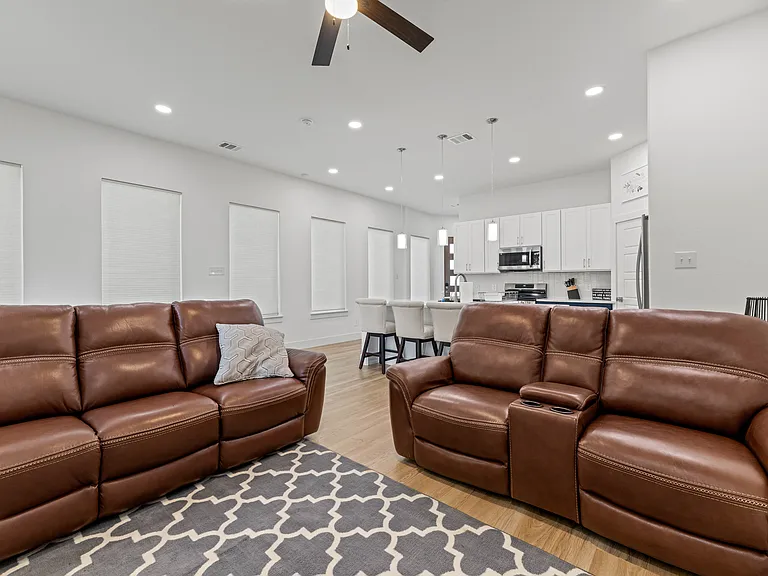 High ten-foot ceilings and a wall of windows adds to the spaciousness of this 2000+ sq ft home.