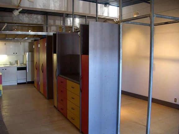 "Private" side of unit features many drawers and closets.