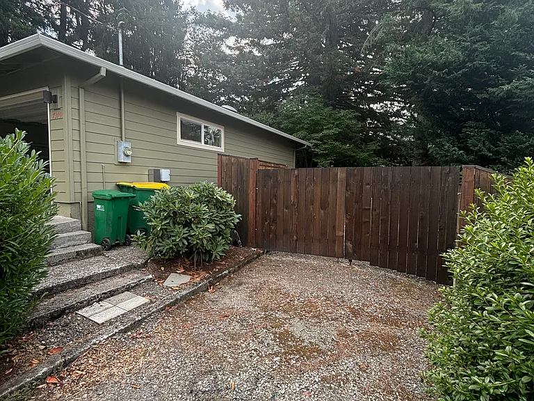 west side of house second driveway with room for 30' RV behind gate, with 30 amp RV plug