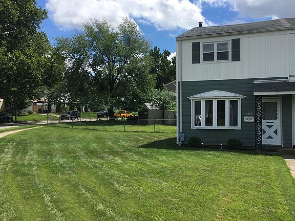 View of front of house and yard from street