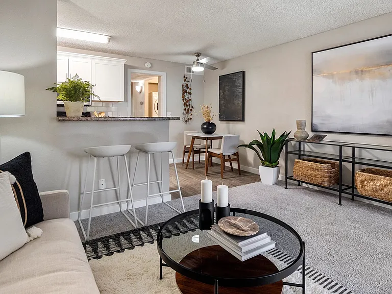 Relish in the renewed vibes of our premium renovation package living rooms, featuring plush carpeting for ultimate comfort.