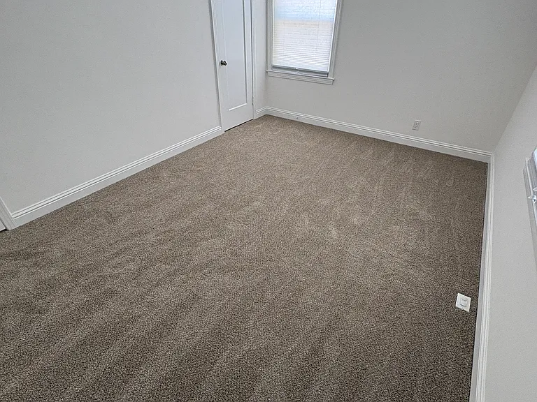 Front bedroom, picture taken from corner of room facing closet