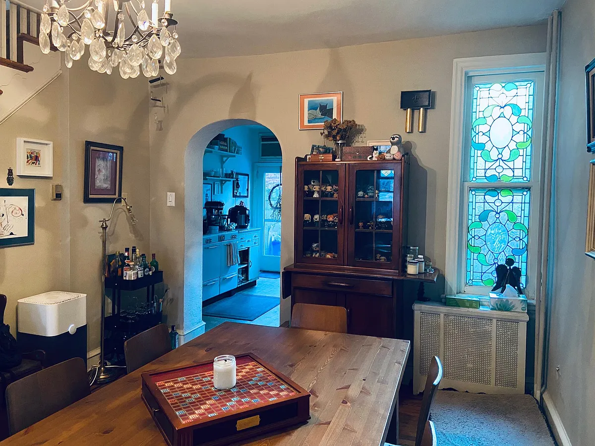 A better view of the gorgeous window and the dining room chandelier - 1206 S Clarion St