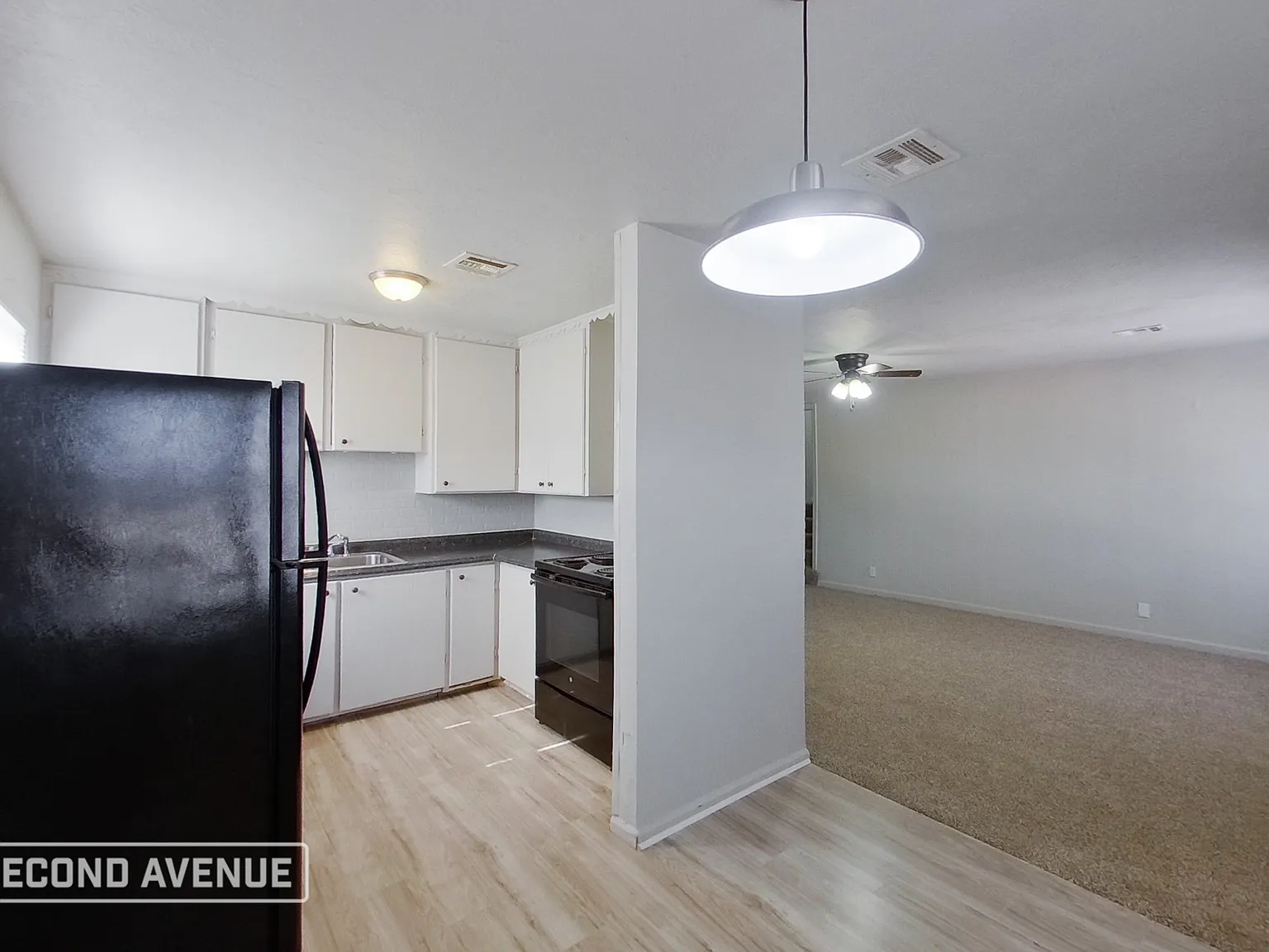 4 bed, 1.0 bath, 1201 sqft, $1,069 — Photo 2