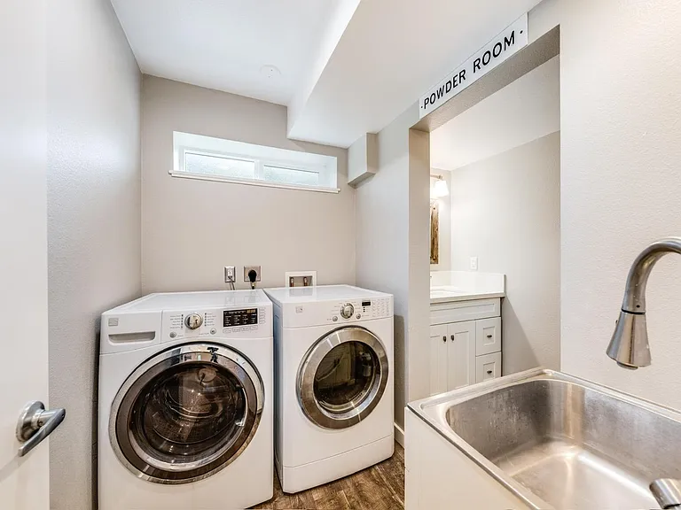 Utility room and half bath on first floor