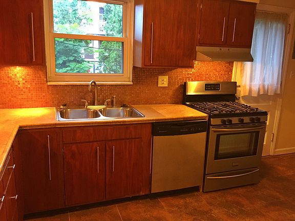 Updated Kitchen with Direct access to yard & laundry