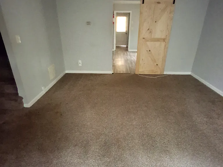 Living room with sliding barn door