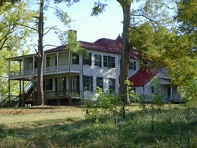 2 story porch overlooks pond